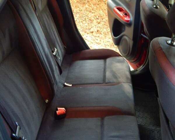 Красный Ниссан Жук, объемом двигателя 1.6 л и пробегом 112 тыс. км за 11500 $, фото 19 на Automoto.ua