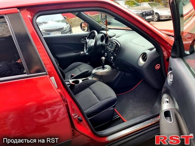 Красный Ниссан Жук, объемом двигателя 1.6 л и пробегом 130 тыс. км за 10700 $, фото 13 на Automoto.ua