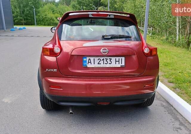 Червоний Ніссан Жук, об'ємом двигуна 1.6 л та пробігом 114 тис. км за 11000 $, фото 3 на Automoto.ua