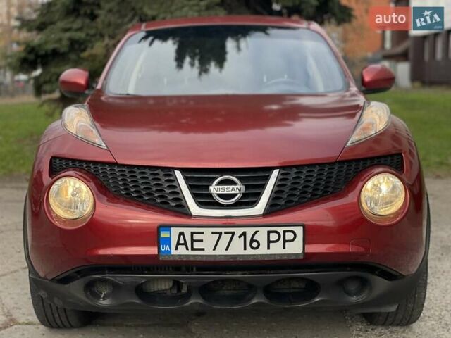 Червоний Ніссан Жук, об'ємом двигуна 1.62 л та пробігом 188 тис. км за 10500 $, фото 1 на Automoto.ua