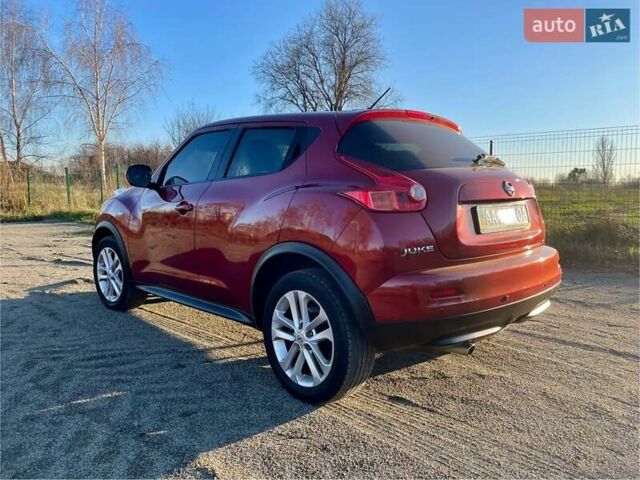 Красный Ниссан Жук, объемом двигателя 1.6 л и пробегом 105 тыс. км за 11300 $, фото 5 на Automoto.ua