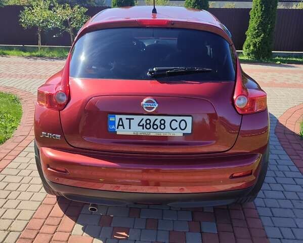 Червоний Ніссан Жук, об'ємом двигуна 1.6 л та пробігом 122 тис. км за 10200 $, фото 10 на Automoto.ua