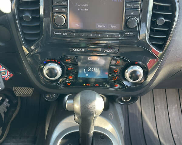 Червоний Ніссан Жук, об'ємом двигуна 1.6 л та пробігом 94 тис. км за 11500 $, фото 23 на Automoto.ua