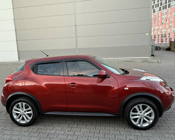 Червоний Ніссан Жук, об'ємом двигуна 1.6 л та пробігом 54 тис. км за 11800 $, фото 3 на Automoto.ua