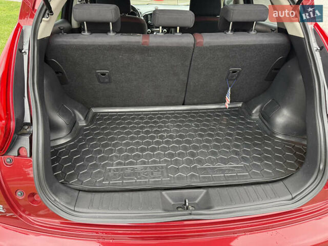 Червоний Ніссан Жук, об'ємом двигуна 1.6 л та пробігом 151 тис. км за 9900 $, фото 16 на Automoto.ua