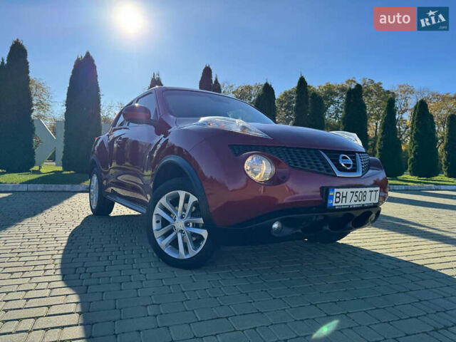 Красный Ниссан Жук, объемом двигателя 1.6 л и пробегом 169 тыс. км за 9800 $, фото 4 на Automoto.ua