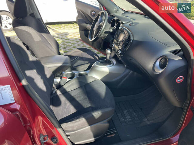 Червоний Ніссан Жук, об'ємом двигуна 1.6 л та пробігом 94 тис. км за 11500 $, фото 27 на Automoto.ua