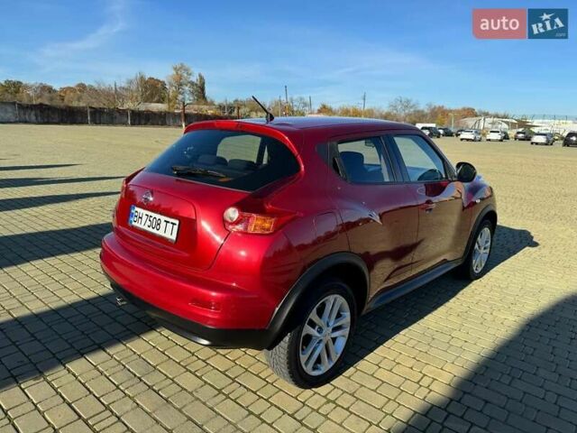 Красный Ниссан Жук, объемом двигателя 1.6 л и пробегом 170 тыс. км за 9700 $, фото 8 на Automoto.ua