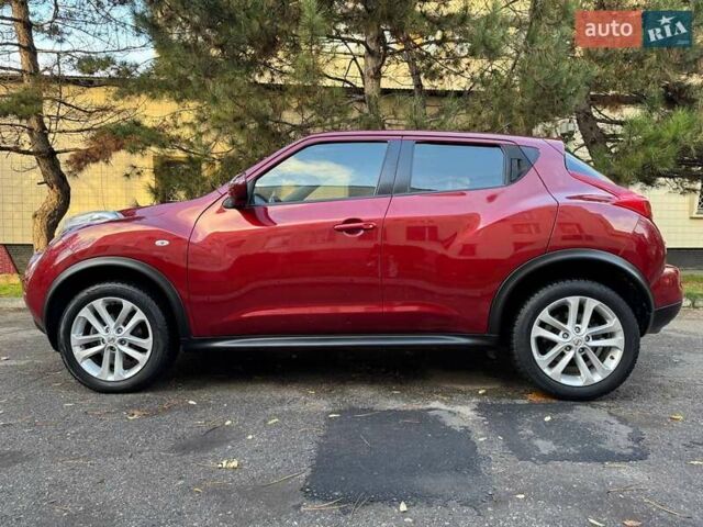 Красный Ниссан Жук, объемом двигателя 1.6 л и пробегом 170 тыс. км за 10300 $, фото 17 на Automoto.ua