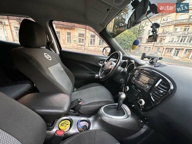 Червоний Ніссан Жук, об'ємом двигуна 1.6 л та пробігом 67 тис. км за 12300 $, фото 7 на Automoto.ua