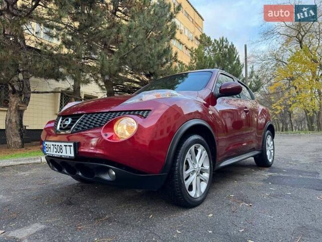 Красный Ниссан Жук, объемом двигателя 1.6 л и пробегом 170 тыс. км за 10300 $, фото 2 на Automoto.ua