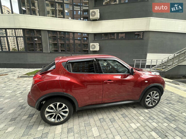 Красный Ниссан Жук, объемом двигателя 1.6 л и пробегом 102 тыс. км за 9200 $, фото 10 на Automoto.ua