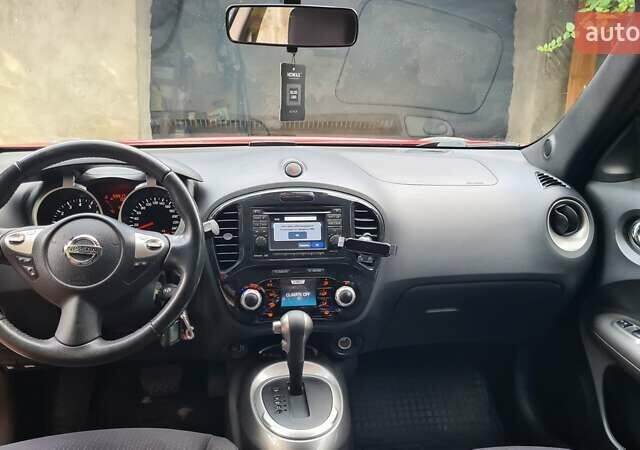 Червоний Ніссан Жук, об'ємом двигуна 1.6 л та пробігом 56 тис. км за 11500 $, фото 6 на Automoto.ua