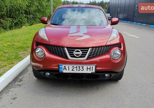 Червоний Ніссан Жук, об'ємом двигуна 1.6 л та пробігом 114 тис. км за 11000 $, фото 1 на Automoto.ua