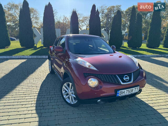 Красный Ниссан Жук, объемом двигателя 1.6 л и пробегом 169 тыс. км за 9800 $, фото 3 на Automoto.ua