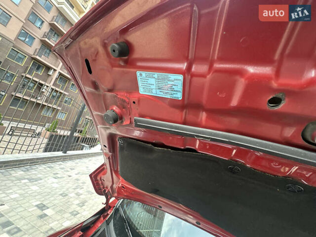 Червоний Ніссан Жук, об'ємом двигуна 1.6 л та пробігом 102 тис. км за 8950 $, фото 14 на Automoto.ua