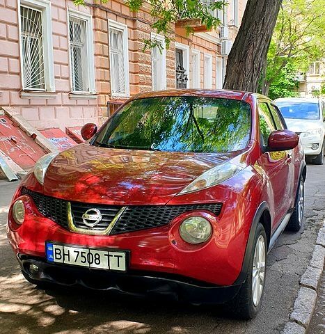 Червоний Ніссан Жук, об'ємом двигуна 1.6 л та пробігом 168 тис. км за 9800 $, фото 1 на Automoto.ua