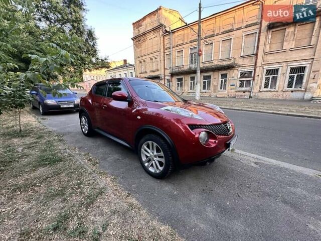 Червоний Ніссан Жук, об'ємом двигуна 1.6 л та пробігом 67 тис. км за 12300 $, фото 5 на Automoto.ua