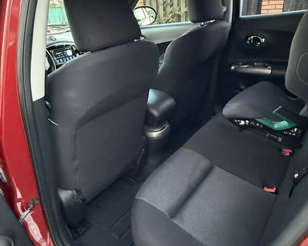 Червоний Ніссан Жук, об'ємом двигуна 1.6 л та пробігом 54 тис. км за 11800 $, фото 11 на Automoto.ua