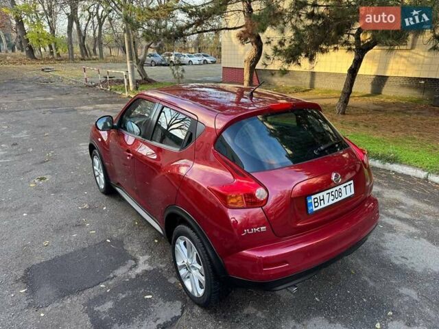 Красный Ниссан Жук, объемом двигателя 1.6 л и пробегом 170 тыс. км за 10300 $, фото 21 на Automoto.ua