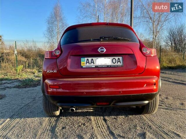 Красный Ниссан Жук, объемом двигателя 1.6 л и пробегом 105 тыс. км за 11300 $, фото 4 на Automoto.ua