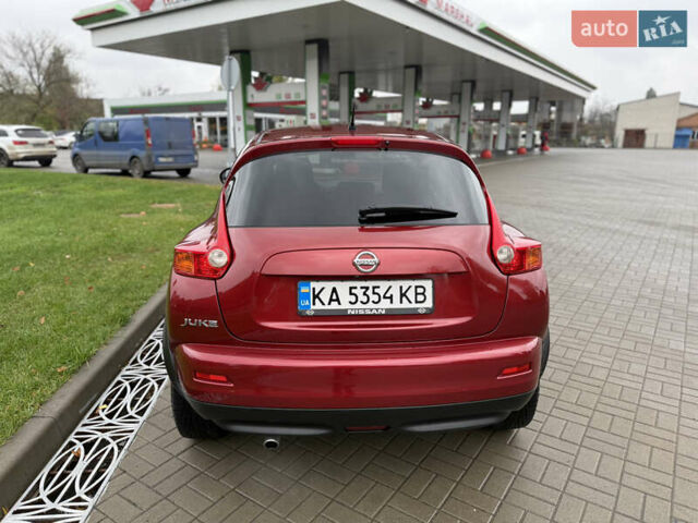 Червоний Ніссан Жук, об'ємом двигуна 1.6 л та пробігом 151 тис. км за 9900 $, фото 2 на Automoto.ua