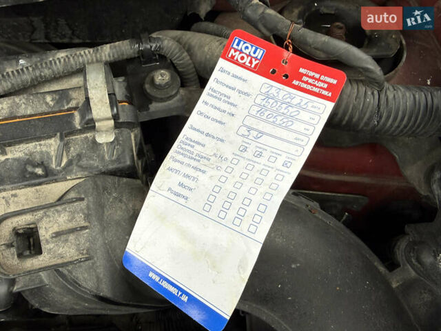 Червоний Ніссан Жук, об'ємом двигуна 1.6 л та пробігом 151 тис. км за 9900 $, фото 10 на Automoto.ua