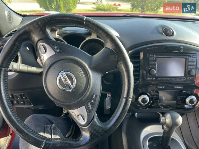 Червоний Ніссан Жук, об'ємом двигуна 1.6 л та пробігом 94 тис. км за 11500 $, фото 20 на Automoto.ua