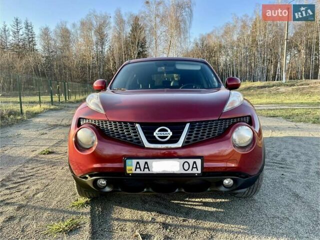 Красный Ниссан Жук, объемом двигателя 1.6 л и пробегом 105 тыс. км за 11300 $, фото 6 на Automoto.ua