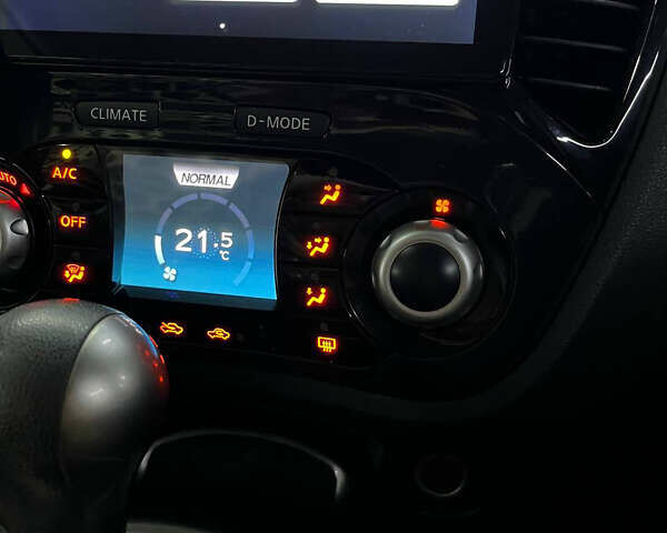 Червоний Ніссан Жук, об'ємом двигуна 1.6 л та пробігом 120 тис. км за 10000 $, фото 4 на Automoto.ua