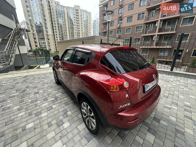 Красный Ниссан Жук, объемом двигателя 1.6 л и пробегом 102 тыс. км за 9200 $, фото 3 на Automoto.ua