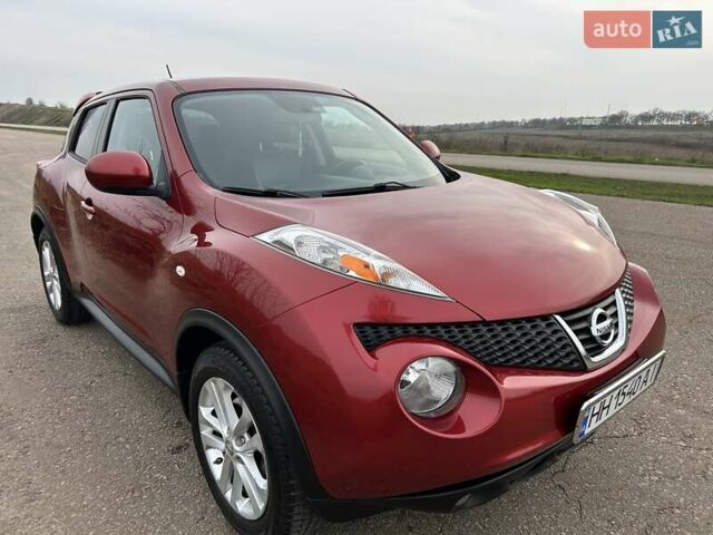 Красный Ниссан Жук, объемом двигателя 1.6 л и пробегом 219 тыс. км за 10200 $, фото 2 на Automoto.ua