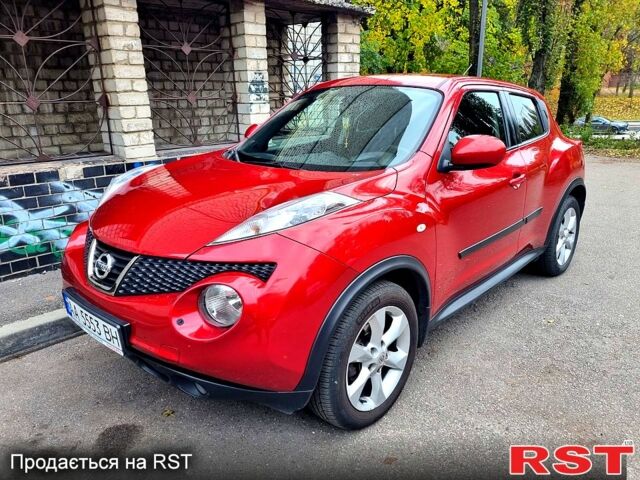 Красный Ниссан Жук, объемом двигателя 1.6 л и пробегом 130 тыс. км за 10700 $, фото 1 на Automoto.ua