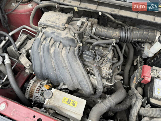 Червоний Ніссан Жук, об'ємом двигуна 1.6 л та пробігом 151 тис. км за 9900 $, фото 11 на Automoto.ua