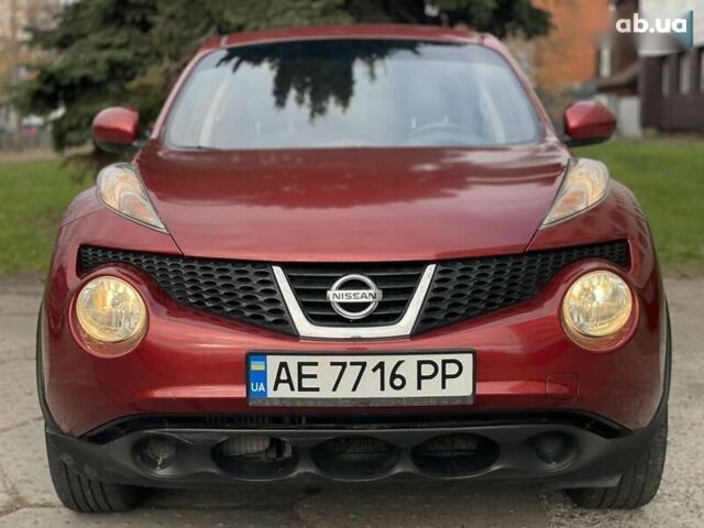 Красный Ниссан Жук, объемом двигателя 1.6 л и пробегом 188 тыс. км за 10500 $, фото 1 на Automoto.ua