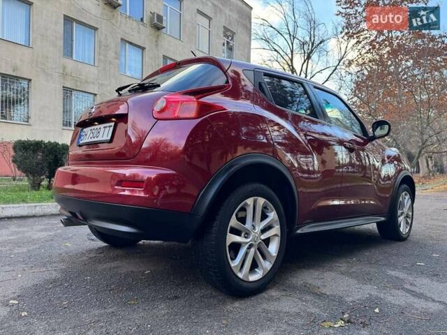 Красный Ниссан Жук, объемом двигателя 1.6 л и пробегом 170 тыс. км за 10300 $, фото 12 на Automoto.ua