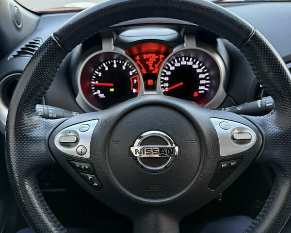 Червоний Ніссан Жук, об'ємом двигуна 1.6 л та пробігом 54 тис. км за 11800 $, фото 14 на Automoto.ua