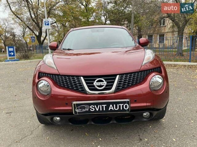 Красный Ниссан Жук, объемом двигателя 1.6 л и пробегом 56 тыс. км за 12200 $, фото 5 на Automoto.ua