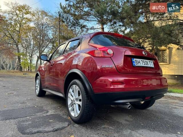 Красный Ниссан Жук, объемом двигателя 1.6 л и пробегом 170 тыс. км за 10300 $, фото 23 на Automoto.ua