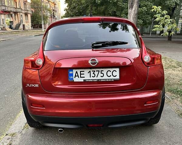 Червоний Ніссан Жук, об'ємом двигуна 1.6 л та пробігом 67 тис. км за 12300 $, фото 13 на Automoto.ua