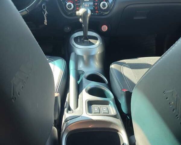 Червоний Ніссан Жук, об'ємом двигуна 1.6 л та пробігом 122 тис. км за 10200 $, фото 11 на Automoto.ua