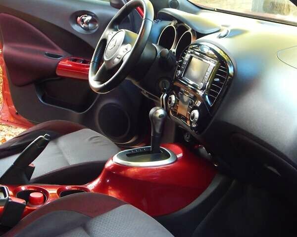 Красный Ниссан Жук, объемом двигателя 1.6 л и пробегом 112 тыс. км за 11500 $, фото 21 на Automoto.ua