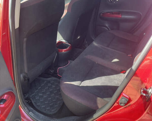 Красный Ниссан Жук, объемом двигателя 1.6 л и пробегом 147 тыс. км за 10700 $, фото 7 на Automoto.ua