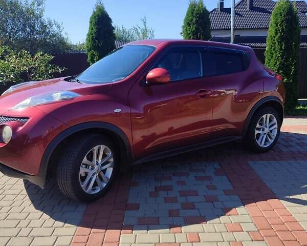 Червоний Ніссан Жук, об'ємом двигуна 1.6 л та пробігом 122 тис. км за 10200 $, фото 4 на Automoto.ua