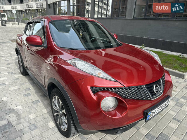 Красный Ниссан Жук, объемом двигателя 1.6 л и пробегом 102 тыс. км за 9200 $, фото 1 на Automoto.ua