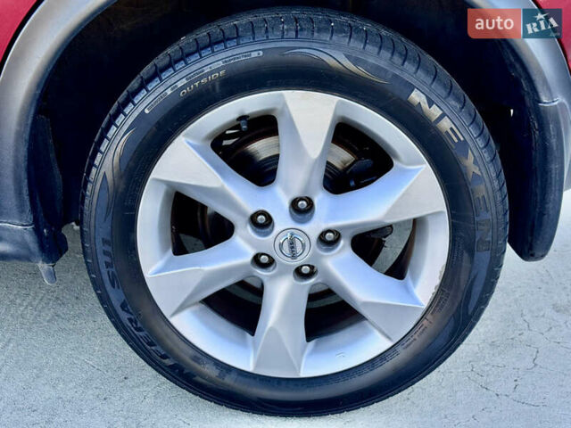 Красный Ниссан Жук, объемом двигателя 1.6 л и пробегом 54 тыс. км за 11500 $, фото 21 на Automoto.ua