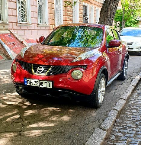 Червоний Ніссан Жук, об'ємом двигуна 1.6 л та пробігом 168 тис. км за 9800 $, фото 2 на Automoto.ua