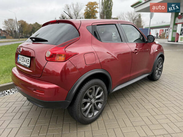 Червоний Ніссан Жук, об'ємом двигуна 1.6 л та пробігом 151 тис. км за 9900 $, фото 5 на Automoto.ua