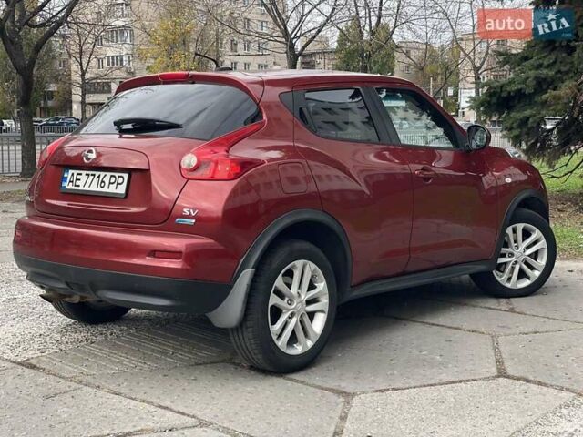 Червоний Ніссан Жук, об'ємом двигуна 1.62 л та пробігом 188 тис. км за 10500 $, фото 3 на Automoto.ua