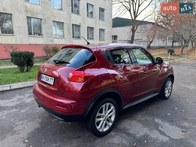Красный Ниссан Жук, объемом двигателя 1.6 л и пробегом 170 тыс. км за 10300 $, фото 14 на Automoto.ua